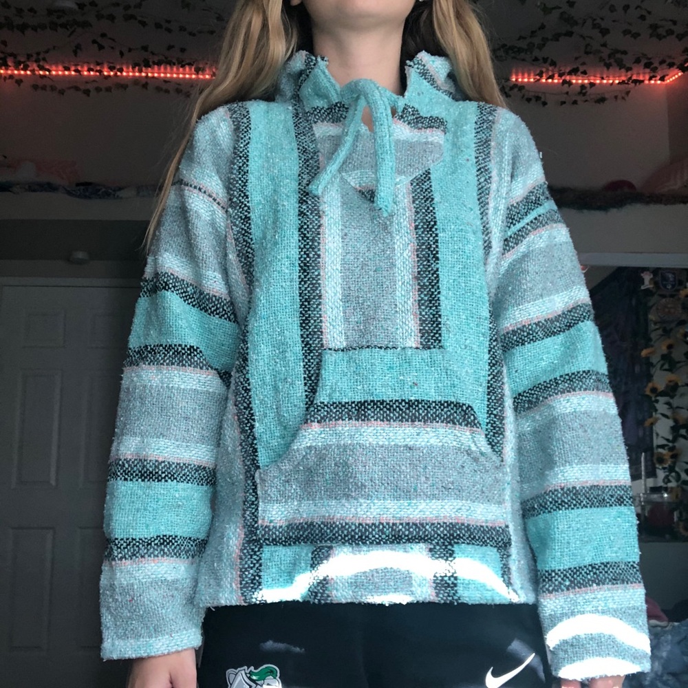 Blue pink and black poncho